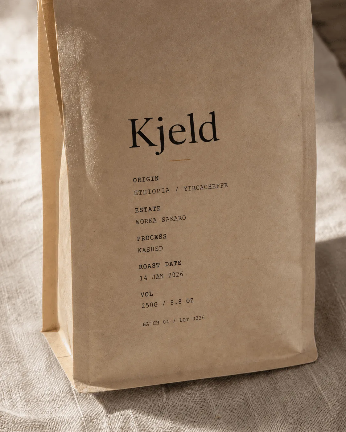 Kjeld wordmark on letterpressed business card
